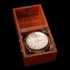 Image of a ship's chronometer housed in its wooden box