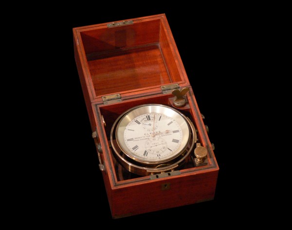Image of a ship's chronometer housed in its wooden box